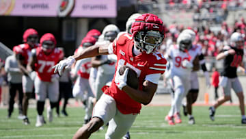 Ohio State Buckeye Scarlet Carnell Tate (17) makes a catch against team Gary in the 1st half during the spring game at Ohio Stadium on April 12, 2025.