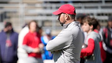 Ohio State Buckeye head coach Ryan Day watches his team warm up before the start of the spring game at Ohio Stadium on April 12, 2025.