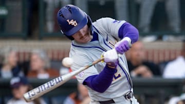 LSU Tigers' Jared Jones (22) foul tips the ball as Auburn Tigers take on LSU Tigers at Plainsman Park in Auburn, Ala., on Saturday, April 12, 2025.