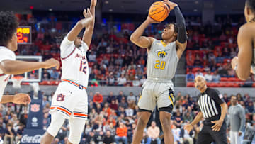 Alabama State Hornets guard TJ Madlock (20) takes a jump shot as Auburn Tigers take on Alabama State Hornets at Neville Arena in Auburn, Ala., on Friday, Dec. 22, 2023.