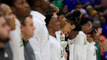 South Florida Bulls stand during the national anthem before the game of an NCAA men’s basketball matchup Monday, Nov. 4, 2024 at VyStar Veterans Memorial Arena in Jacksonville, Fla. [Corey Perrine/Florida Times-Union]