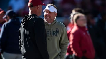 Alabama Crimson Tide head coach Kalen DeBoer and Auburn Tigers head coach Hugh Freeze