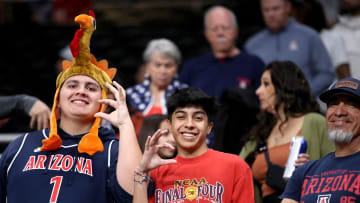 Arizona Wildcats fans Gabriel Leon, left, and Sean Neave, both of Tucson attend the first-ever Acrisure Classic in Palm Desert, Calif., on Thanksgiving Day, Nov. 23, 2023.