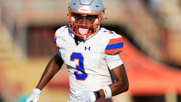 Bolles' Naeem Burroughs (3) watches a kickoff bounce during the first quarter of a high school football matchup Thursday, May 23, 2024 at Mandarin High School in Jacksonville, Fla. Mandarin defeated Bolles 35-14.