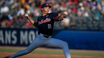 Ole Miss Rebels' Mason Morris (21) pitches as Arkansas Razorbacks take on Ole Miss Rebels during the SEC baseball tournament at Hoover Met in Birmingham, Ala., on Friday, May 23, 2025. Ole Miss Rebels defeated Arkansas Razorbacks 5-2.