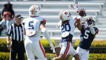 Auburn Tigers defensive back JC Hart (20) breaks up a pass intended for Auburn Tigers wide receiver Jay Fair (5) during the A-Day spring game at Jordan-Hare Stadium in Auburn, Ala., on Saturday, April 6, 2024.