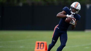 Auburn Tigers wide receiver Bryce Cain (6) runs through drills during practice at Woltosz Football Performance Center in Auburn, Ala., on Tuesday, April 2, 2024.