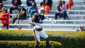 Auburn Tigers wide receiver Cam Coleman (8) celebrates his touchdown catch during the A-Day spring game at Jordan-Hare Stadium in Auburn, Ala., on Saturday, April 6, 2024.