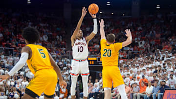 Auburn Tigers forward Chad Baker-Mazara (10) takes a jump shot as Auburn Tigers take on Vermont Catamounts at Neville Arena in Auburn, Ala., on Wednesday, Nov. 6, 2024. Auburn Tigers leads Vermont Catamounts 46-21 at halftime.
