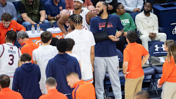 Auburn Tigers forward Johni Broome (4) joins his team in the huddle after an injury as Auburn Tigers take on Georgia State Panthers at Neville Arena in Auburn, Ala., on Tuesday, Dec. 17, 2024. Auburn Tigers defeated Georgia State Panthers 100-59.