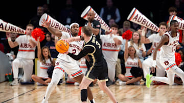 Auburn Tigers guard Denver Jones (2) guards Purdue Boilermakers guard Braden Smith (3) as Auburn Tigers take on Purdue Boilermakers at Legacy Arena in Birmingham, Ala., on Saturday, Dec. 21, 2024. Auburn Tigers lead Purdue Boilermakers 41-26 at halftime.