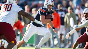 Auburn Tigers quarterback Walker White (9) runs the ball as Auburn Tigers take on Louisiana-Monroe Warhawks at Jordan-Hare Stadium in Auburn, Ala., on Saturday, Nov. 16, 2024. Auburn Tigers defeated Louisiana-Monroe Warhawks 48-14.