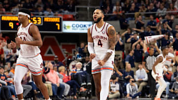 Auburn Tigers forward Johni Broome (4) celebrates a three-pointer as Auburn Tigers take on Missouri Tigers at Neville Arena in Auburn, Ala., on Saturday, Jan. 4, 2025.