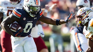Auburn Tigers running back Damari Alston (0) runs the ball into the end zone for a touchdown as Auburn Tigers take on Louisiana-Monroe Warhawks at Jordan-Hare Stadium in Auburn, Ala., on Saturday, Nov. 16, 2024. Auburn Tigers defeated Louisiana-Monroe Warhawks 48-14.