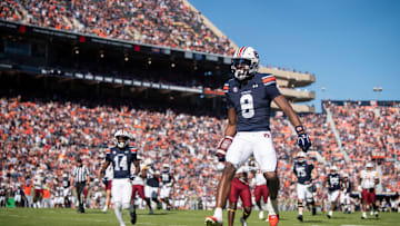 Auburn Tigers wide receiver Cam Coleman (8) jumps into the end zone for a touchdown after a catch as Auburn Tigers take on Louisiana-Monroe Warhawks at Jordan-Hare Stadium in Auburn, Ala., on Saturday, Nov. 16, 2024.