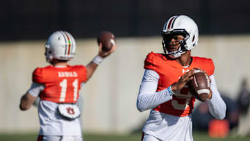 Auburn Tigers quarterback Jackson Arnold (11) and Deuce Knight (9) throw the ball during football practice at Woltosz Football Performance Center in Auburn, Ala., on Thursday, April 10, 2025.