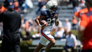 Auburn Tigers running back Jeremiah Cobb (23) runs the ball during Auburn Tigers A-Day football practice at Jordan-Hare Stadium in Auburn, Ala., on Saturday, April 12, 2025.