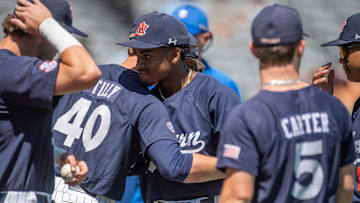 Auburn Tigers players greet each other before the game as Auburn Tigers take on Texas A&M Aggies during the SEC baseball tournament at Hoover Met in Birmingham, Ala., on Thursday, May 22, 2025.