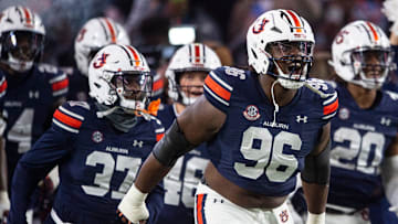 Auburn Tigers defensive lineman Philip Blidi (96) leads his team onto the field as Auburn Tigers take on Texas A&M Aggies at Jordan-Hare Stadium in Auburn, Ala., on Saturday, Sept. 7, 2024.