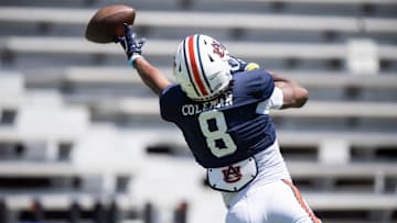 A pass sails over the reach of Auburn Tigers wide receiver Cam Coleman (8) during Auburn Tigers A-Day football practice at Jordan-Hare Stadium in Auburn, Ala., on Saturday, April 12, 2025.