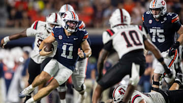 Auburn Tigers quarterback Jackson Arnold (11) runs the ball as Auburn Tigers take on Ball State Cardinals at Jordan-Hare Stadium in Auburn, Ala. on Saturday, Sept. 6, 2025. Auburn Tigers lead Ball State Cardinals 21-0 at halftime.