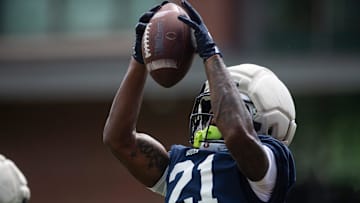 Auburn Tigers running back Durell Robinson (21) catches the ball during practice at Woltosz Football Performance Center in Auburn, Ala. on Thursday, Aug. 14, 2025.