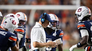 Auburn Tigers defensive coordinator DJ Durkin huddles with his team as Auburn Tigers take on Ball State Cardinals at Jordan-Hare Stadium in Auburn, Ala. on Saturday, Sept. 6, 2025. Auburn Tigers defeated Ball State Cardinals 42-3.