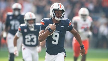 Auburn Tigers quarterback Deuce Knight (9) breaks free for a touchdown run on the first play of the game as Auburn Tigers take on Mercer Bears at Jordan-Hare Stadium in Auburn, Ala. on Saturday, Nov. 22, 2025.