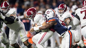 Auburn Tigers linebacker Xavier Atkins (17) sacks Alabama Crimson Tide quarterback Ty Simpson (15) as Auburn Tigers take on Alabama Crimson Tide in the Iron Bowl at Jordan-Hare Stadium in Auburn, Ala. on Saturday, Nov. 29, 2025. Alabama Crimson Tide leads Auburn Tigers 17-6.
