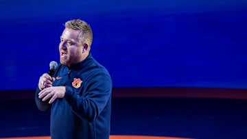 Newly hired Auburn football head coach Alex Golesh talks to fans as Auburn Tigers take on NC State Wolfpack at Neville Arena in Auburn, Ala. on Wednesday, Dec. 3, 2025. Auburn Tigers lead NC State Wolfpack 41-35 at halftime.