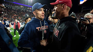 Auburn Tigers interim head coach DJ Durkin and Alabama Crimson Tide head coach Kalen DeBoer shake hands after the game as Auburn Tigers take on Alabama Crimson Tide in the Iron Bowl at Jordan-Hare Stadium in Auburn, Ala. on Saturday, Nov. 29, 2025. Alabama Crimson Tide defeated Auburn Tigers 27-20.