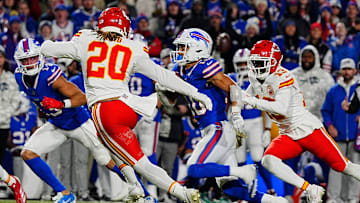 Bills Mack Hollins watches as teammate Khalil Shakir slips between Kansas City's Justine Reid and Nazeeh Johnson for a gain of about five-yards during second half action against the Kansas City Chiefs in Orchard Park, Nov.17, 2024.