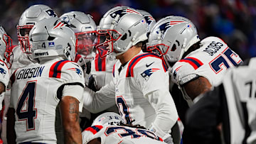 New England Patriots quarterback Drake Maye (10) talks to his offensive line in the huddle during second half action at Highmark Stadium where the Buffalo Bills hosted the New England Patriots in Orchard Park on Dec. 22, 2024.
