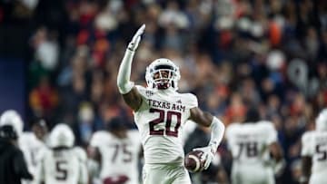 Texas A&M Aggies defensive back BJ Mayes (20) celebrates his interception as Auburn Tigers take on Texas A&M Aggies at Jordan-Hare Stadium in Auburn, Ala., on Saturday, Sept. 7, 2024. Auburn Tigers defeated Texas A&M Aggies 43-41 in fourth overtime.