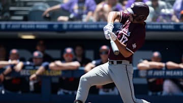 Texas A&M Aggies' Jace LaViolette (17) is hit in the hands by a pitch as Auburn Tigers take on Texas A&M Aggies during the SEC baseball tournament at Hoover Met in Birmingham, Ala., on Thursday, May 22, 2025.