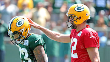 Green Bay Packers quarterback Aaron Rodgers (12) gives cornerback Jaire Alexander (23) and encouraging pat on the helmet during Green Bay Packers Training Camp Saturday, July 28, 2018 at Ray Nitschke Field in Ashwaubenon, Wis

Packers 2018 04