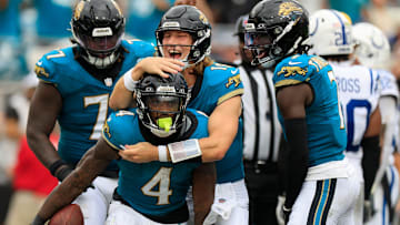 Jacksonville Jaguars quarterback Trevor Lawrence (16) celebrates a touchdown scored by running back Tank Bigsby (4) during the third quarter of NFL football matchup Sunday, Oct. 6, 2024 at EverBank Stadium in Jacksonville, Fla. 