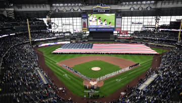 Apr 3, 2023; Milwaukee, Wisconsin, USA; Players line up for Opening Day ceremony at American Family