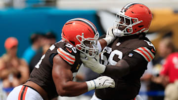 Cleveland Browns defensive end Myles Garrett (95), left, drills on offensive tackle James Hudson III (66) before an NFL football matchup Sunday, Sept. 15, 2024 at EverBank Stadium in Jacksonville, Fla. [Corey Perrine/Florida Times-Union]