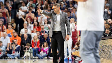 Alabama Crimson Tide head coach Nate Oats talks with his team as Auburn Tigers take on Alabama Crimson Tide at Neville Arena in Auburn, Ala., on Saturday, March 8, 2025. Alabama Crimson Tide lead Auburn Tigers 45-42 at halftime.