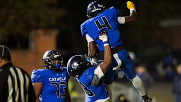 Catholic's Jamarion Williams (4) celebrates his touchdown run at Montgomery Catholic Preparatory School in Montgomery, Ala., on Friday, Nov. 29, 2024. Montgomery Catholic leads Vigor 14-7 at halftime.