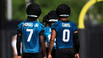 Jacksonville Jaguars wide receiver Brian Thomas Jr. (7), wide receiver Gabe Davis (0) and wide receiver Christian Kirk (13) look on during the first day of an NFL football training camp practice Wednesday, July 24, 2024 at EverBank Stadium’s Miller Electric Center in Jacksonville, Fla.