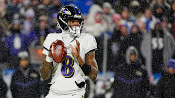 Baltimore Ravens quarterback Lamar Jackson gets ready to launch the ball during first half action at the Buffalo Bills divisional game against the Baltimore Ravens at Highmark Stadium in Orchard Park on Jan. 19, 2025.
