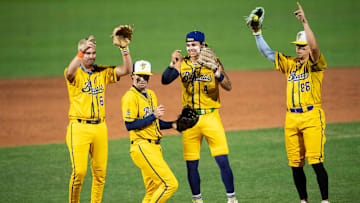 Savannah Bananas players dance on the mound as the Auburn Tigers face off with the Banana Ball All-Stars at Plainsman Park in Auburn, Ala. on Saturday, Oct. 25, 2025.