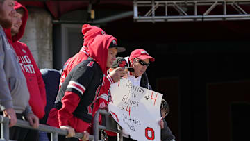 Ohio State Buckeye fans watch as the players head to the locker room at Ohio Stadium before the spring game.