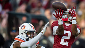 Alabama Crimson Tide wide receiver Ryan Williams (2) drops a pass guarded by Auburn Tigers defensive back Jay Crawford (23) as Auburn Tigers take on Alabama Crimson Tide at Bryant-Denny Stadium in Tuscaloosa, Ala., on Saturday, Nov. 30, 2024. Alabama Crimson Tide leads Auburn Tigers 14-6 at halftime.