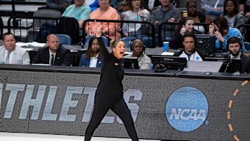Tennessee Volunteers head coach Kim Caldwell talks with her team as Tennessee Volunteers face off with Texas Longhorns during the Sweet 16 at Legacy Arena in Birmingham, Ala., on Saturday, March 29, 2025. Texas Longhorns defeated Tennessee Volunteers 67-59 to advance to the Elite 8.
