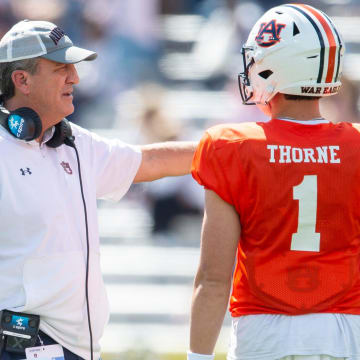 Auburn Tigers quarterbacks coach Kent Austin, quarterback Payton Thorne