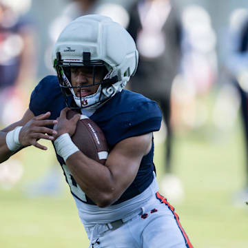 Auburn Tigers running back Jeremiah Cobb (23) runs the ball during football practice at Woltosz Football Performance Center in Auburn, Ala., on Thursday, April 10, 2025.