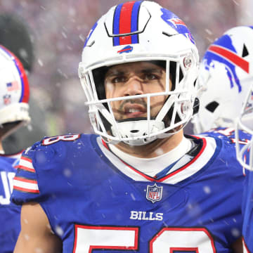 Buffalo Bills Matt Milano makes a face as he watches the action on the large screen hanging over the field.  The Bills hosted the Cincinnati Bengals in their division playoff game and lost, Jan. 22, 2023.

Bills Matt Milano